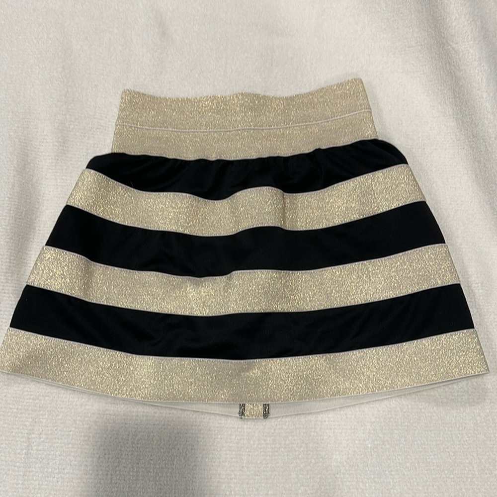 Teen girl gold and black mini skirt